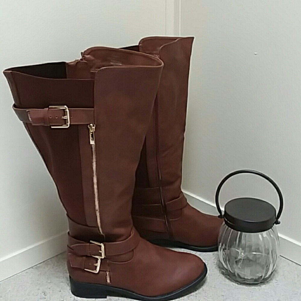 New with tags Torrid Boots Size 9 wide.